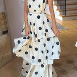 Completo top senza maniche con gonna a balze e scollo all'americana a pois