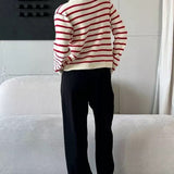 Cardigan corto in maglia a righe