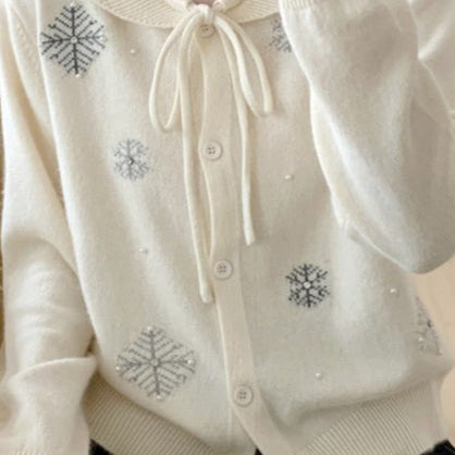 Cardigan con colletto annodato a fiocco di neve con perline