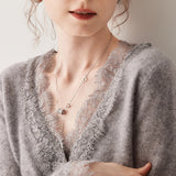 Cardigan in maglia con scollo a V e pizzo in cashmere