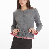 Blusa corta in maglia con pannelli stretti in vita