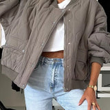 Cappotto imbottito casual con bottoni tinta unita