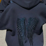 Felpa con cappuccio rilassata con grafica a forma di ala e paillettes