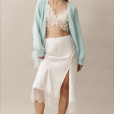 Cardigan in maglia trasparente con volant