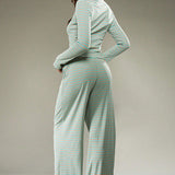 Set due pezzi con bottoni a righe e cordoncino