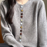 Cardigan in velluto tinta unita con bottoni colorati