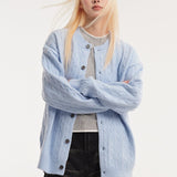 Cardigan a trecce dalla vestibilità rilassata