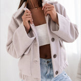 Cappotto alla moda in lana tinta unita con elastico e bottoni automatici