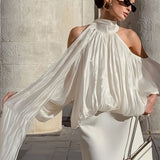 Blusa a maniche lunghe con spalle scoperte dal design unico