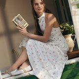 Completo due pezzi con gonna lunga e gilet con orlo a palloncino stampato in raso