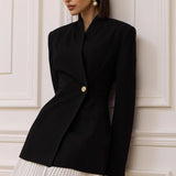 Blazer elegante con vita arricciata