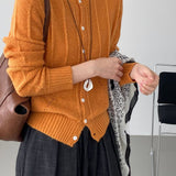 Cardigan in maglia di lana atmosferica