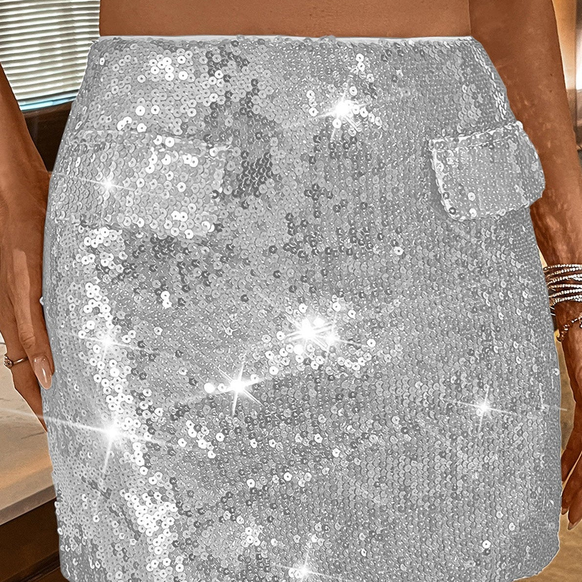 Minigonna aderente con paillettes