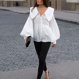 Camicetta vintage con colletto e maniche a sbuffo plissettate