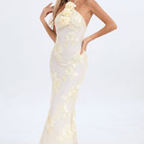 Abito lungo con stampa floreale laminata e scollo all'americana