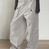 Pantaloni cargo in denim retrò a vita bassa con tasche