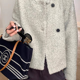 Cappotto alla moda in lana con bottoni automatici