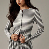 Set due pezzi con bottoni a righe e cordoncino