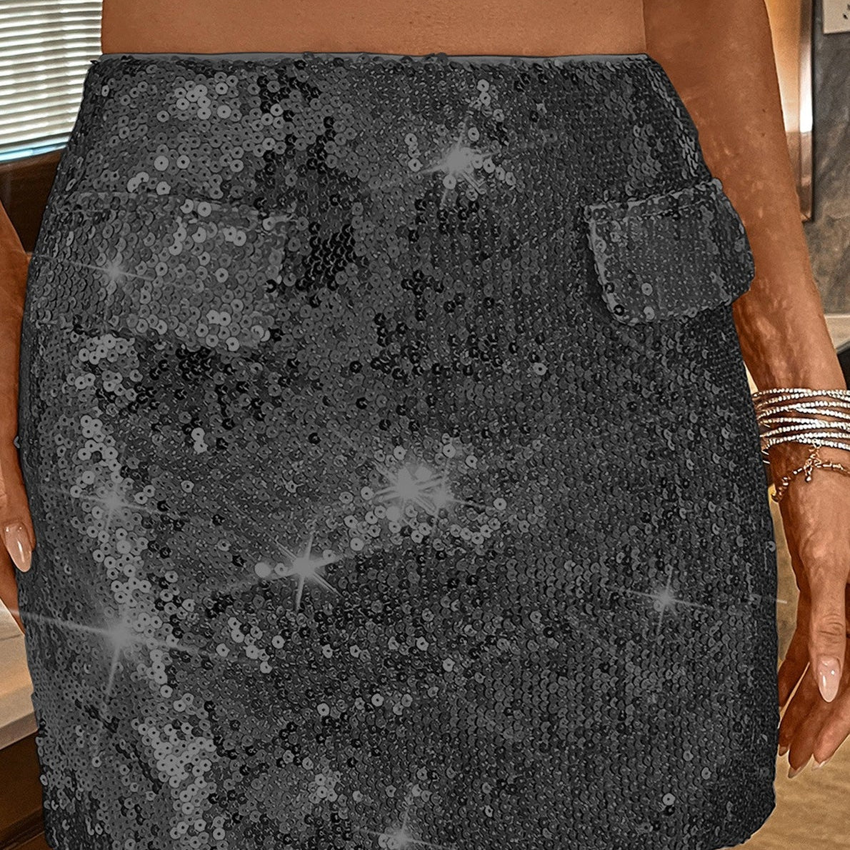 Minigonna aderente con paillettes