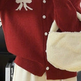 Cardigan rotondo in jacquard con fiocco morbido