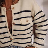 Blusa in maglia a maniche lunghe con bottoni a righe