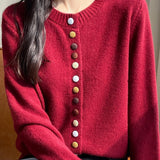 Cardigan in velluto tinta unita con bottoni colorati