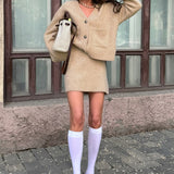 Completo due pezzi chic con gonna cardigan in tweed tinta unita