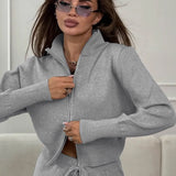 Completo da pendolare in maglia aderente con cerniera bidirezionale