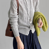 Cardigan in maglia di lana atmosferica