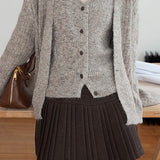 Gonna a vita alta plissettata in lana tinta unita