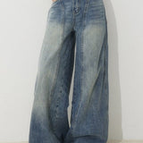 Jeans larghi a vita alta con gamba a falce