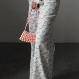 Jeans a gamba larga a vita alta con stampa floreale blu chiaro