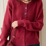 Cardigan con fibbia ricamata a scollo tondo