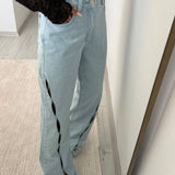 Jeans dritti vintage con tagli rovinati