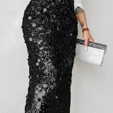 Gonna midi a vita alta con paillettes tinta unita