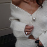 Elegante completo due pezzi con gonna in maglia a coste