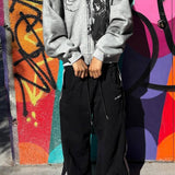 Felpa con cappuccio rilassata con stampa street e bordi in pelliccia