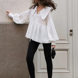 Camicetta vintage con colletto e maniche a sbuffo plissettate