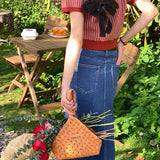 Cardigan a maniche corte con colletto rovesciato in maglia sottile