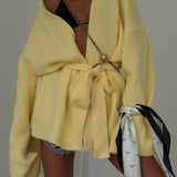 Cardigan midi con cintura