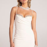 Abito corto da festa a trapezio con strass e canotta