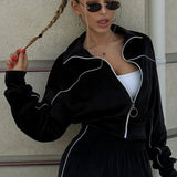 Completo sportivo in due pezzi con colletto in velluto e cerniera a maniche lunghe