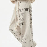 Jeans dritti in denim con graffiti color albicocca