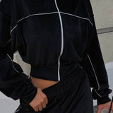 Completo sportivo in due pezzi con colletto in velluto e cerniera a maniche lunghe