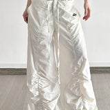 Pantaloni cargo bianchi a gamba larga con coulisse