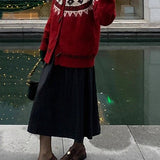 Cardigan retrò in maglia larga con bottoni in corno e colletto jacquard