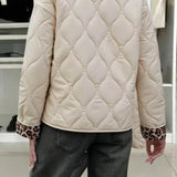 Giacca rilassata con stampa leopardata patchwork