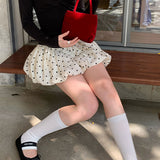 Minigonna a trapezio con elastico in vita e pois retrò