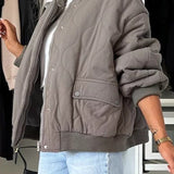 Cappotto imbottito casual con bottoni tinta unita