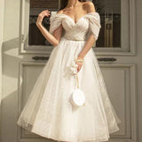 Elegante abito da festa midi con scollo a V e maniche raglan